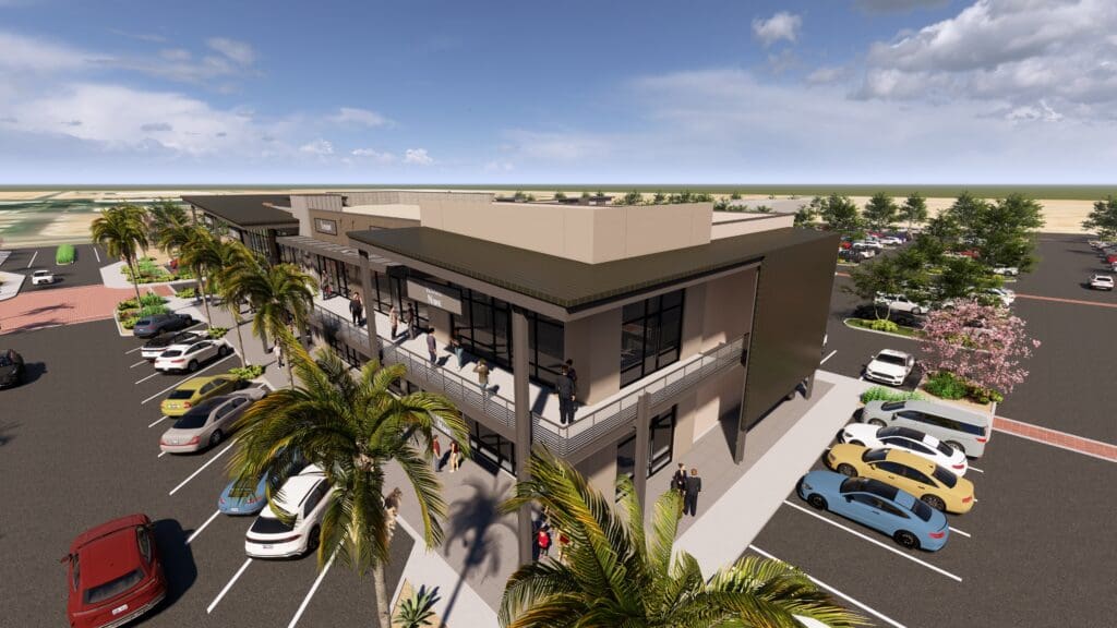 Elevated view of a modern retail building with palm trees at The Shops at Marley Park.