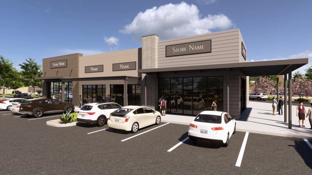 Front exterior of a modern retail plaza at The Shops at Marley Park with parked cars.