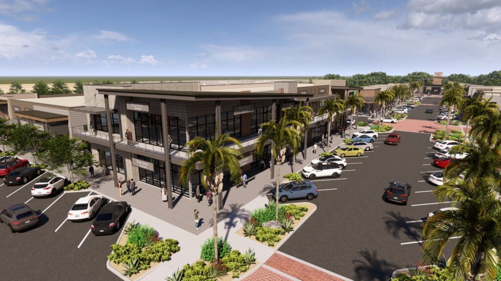 Elevated view of palm-lined retail buildings and parking at Marley Park.