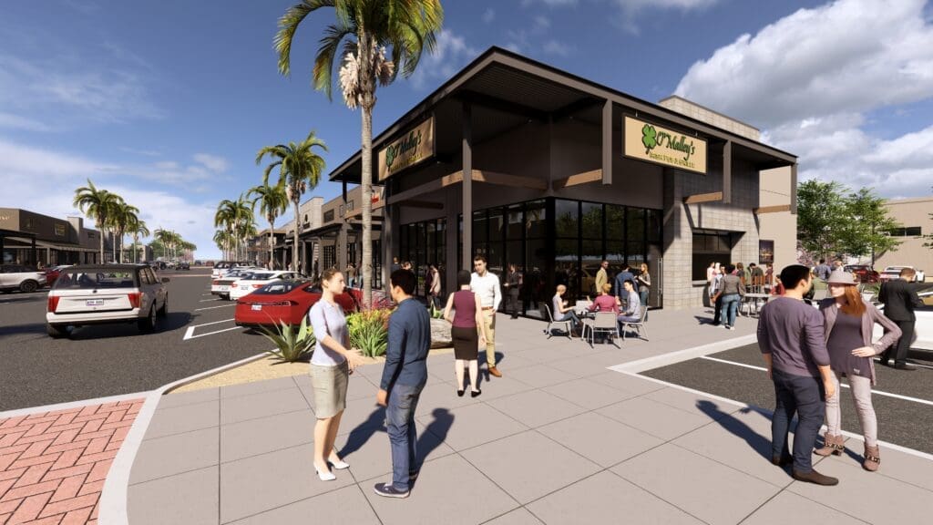 Visitors walking through a sunny courtyard at The Shops at Marley Park.